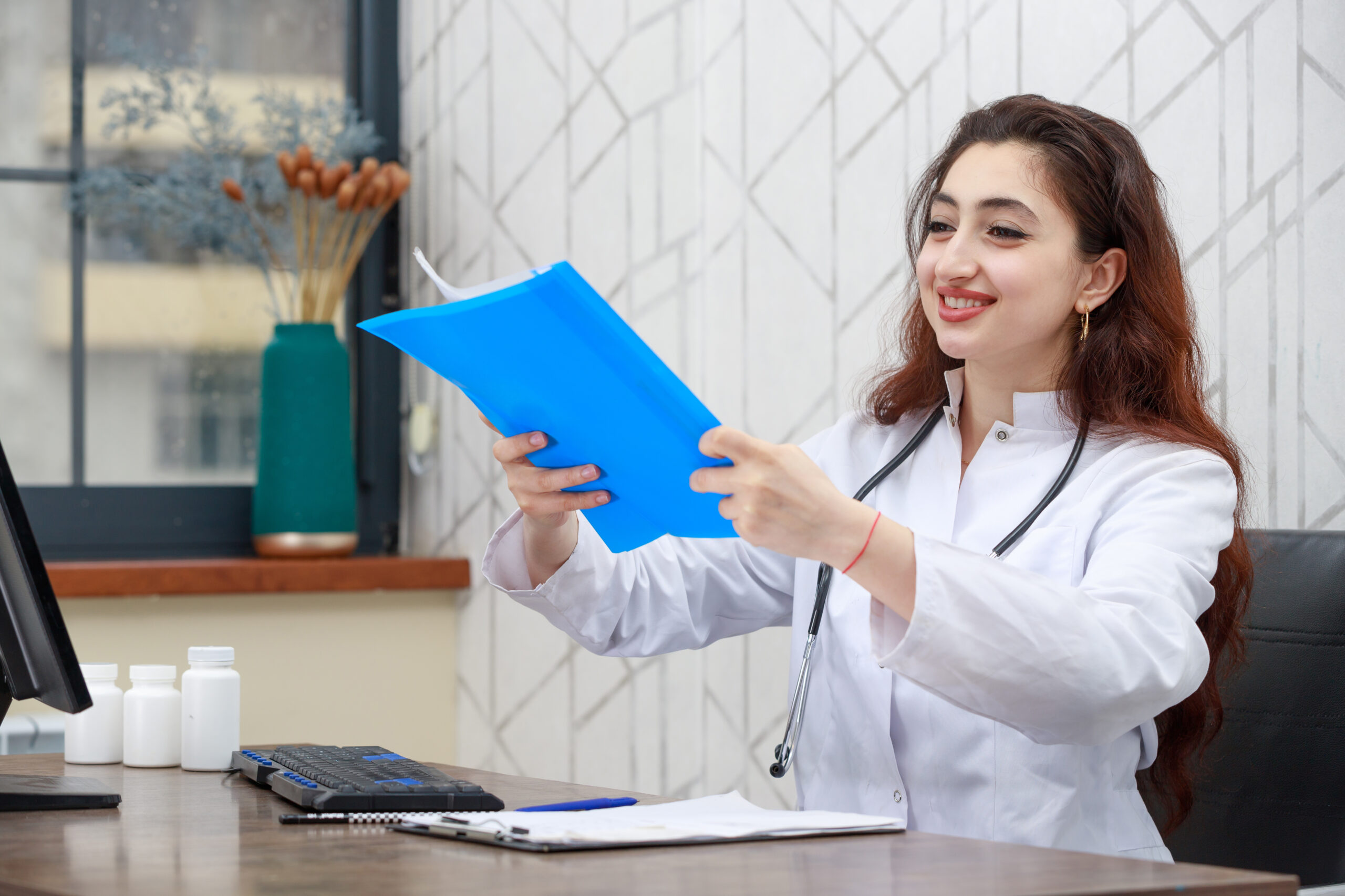 portrait young smiling health care worker holding analysis scaled